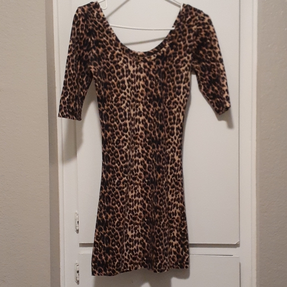 Dresses & Skirts - Animal print mini dress body con